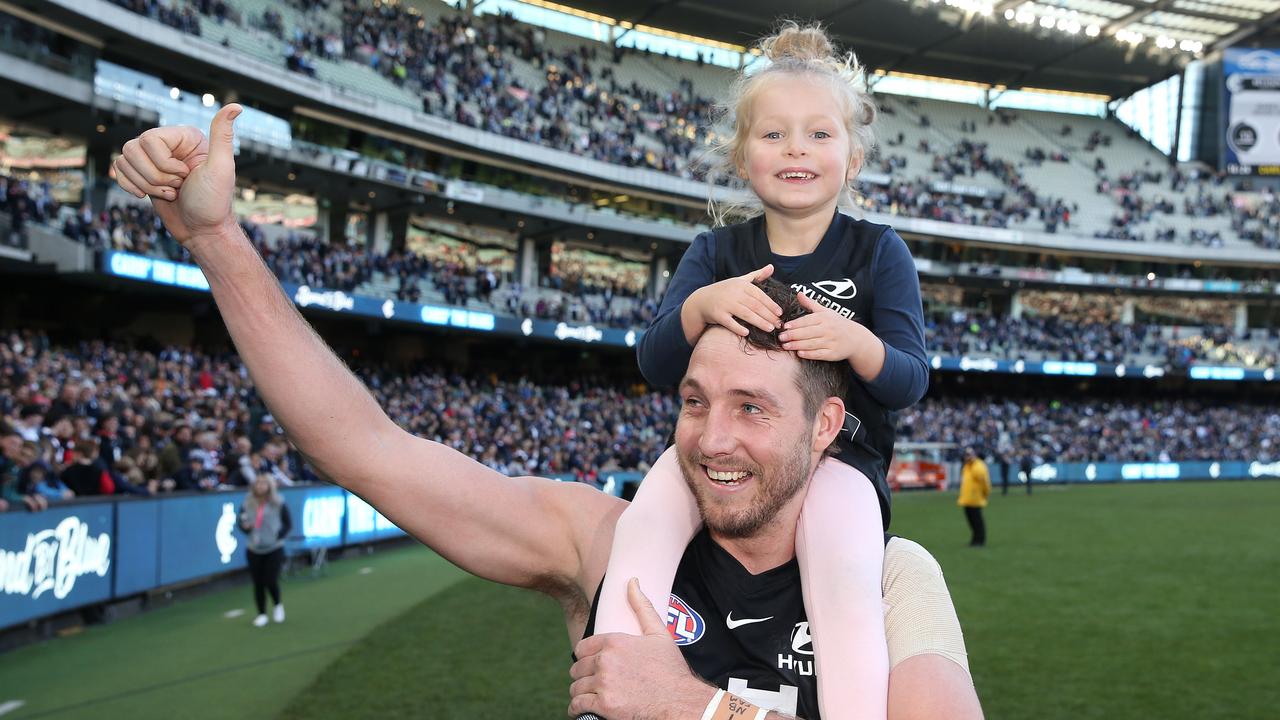 Dale Thomas with his daughter Matilda after the win over St Kilda on Saturday.
