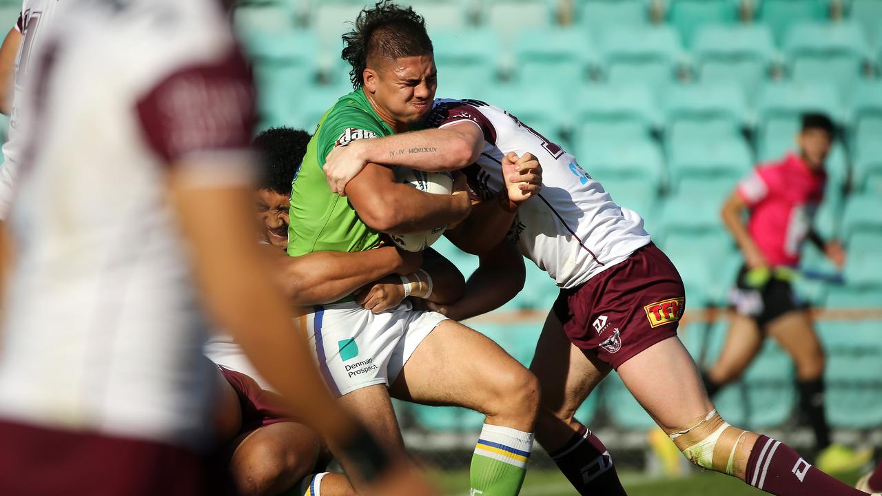 Canberra Raiders forward Trey Mooney charging through the Manly Sea Eagles defence in the SG Ball semi.