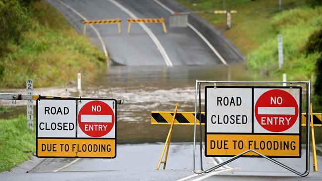 Hardys Rd on the Gold Coast was closed because of flooding on Wednesday. Picture: NewsWire / John Gass