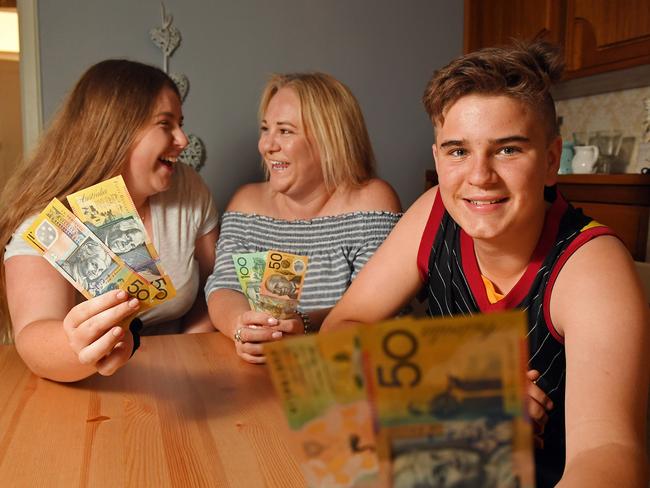 25/01/19 - Mother-of-two Danielle Smith uses a Christmas Club account to stash money throughout the year for Christmas spending.  Pictured with son Thomas, 14, and friend Georgia Gower, 17.Picture: Tom Huntley