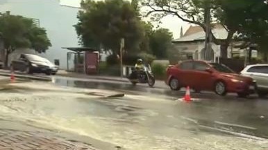 A burst main on Payneham Rd is causing headaches for rush-hour commuters. Picture: 7NEWS