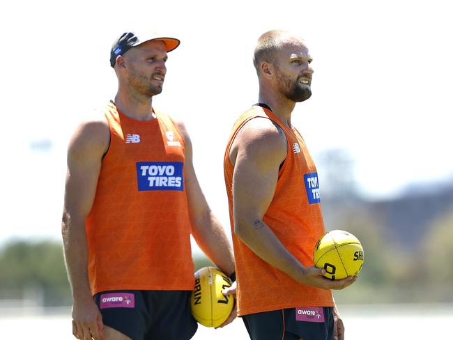 Stringer (R) is slowly building his connection with fellow forwards like Jesse Hogan. Picture: Phil Hillyard