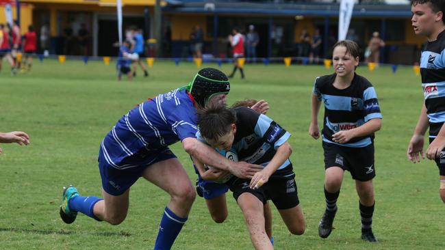 Day 1 of the King of the Country junior rugby union tournament at the Gold Coast Eagles Rugby Union Club.Maroochydore Swans (BLUE AND BLACK) vs USQ Saints (Blue ) Maroochydore Player No USQ Player No Pic Mike Batterham