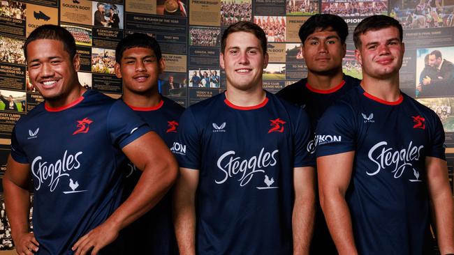 Daily Telegraph. 15, February, 2024. Sydney Roosters Academy players, Loka Toia, Peter Uini, Jake Elliott, De La Salle Va'a and Blake Steep, at Allianz Stadium, today. Picture: Justin Lloyd.