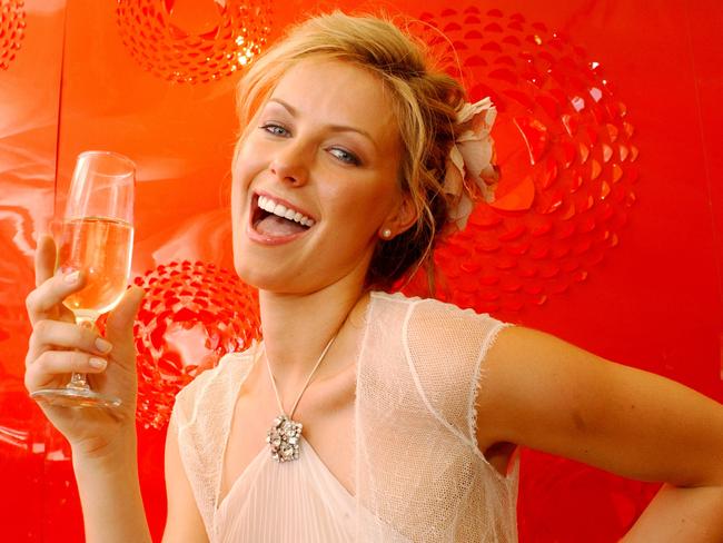 2004 Derby Day: Fashion at Flemington — Miss Universe, Jennifer Hawkins toasts the Spring Racing season. Picture: News Corp