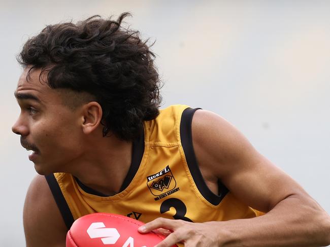 PERTH, AUSTRALIA - JUNE 23: Malakai Champion of Western Australia in action during the Marsh AFL National Championships match between U18 Boys Western Australia and Victoria Metro at Optus Stadium on June 23, 2024 in Perth, Australia. (Photo by Paul Kane/AFL Photos/via Getty Images)