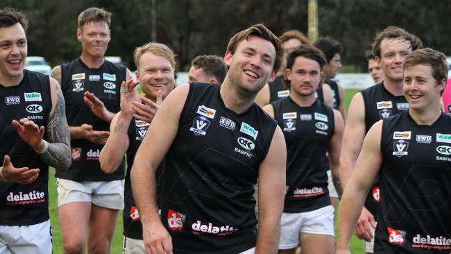 Lachlan Thompson, centre, with Benalla All Blacks teammates after kicking his 100th goal for the season. Picture: Garry Jones