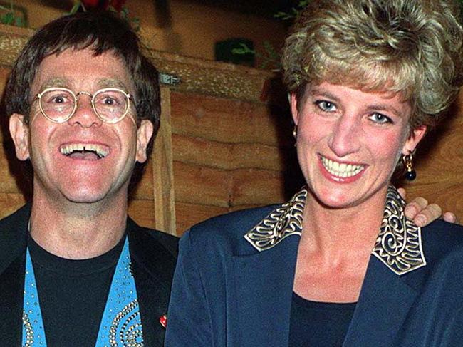 Mandatory Credit: Photo By RICHARD YOUNG / Rex FeaturesELTON JOHN WITH PRINCESS DIANA1993 British royalty backstage at concert laughing hand on shoulder arm round