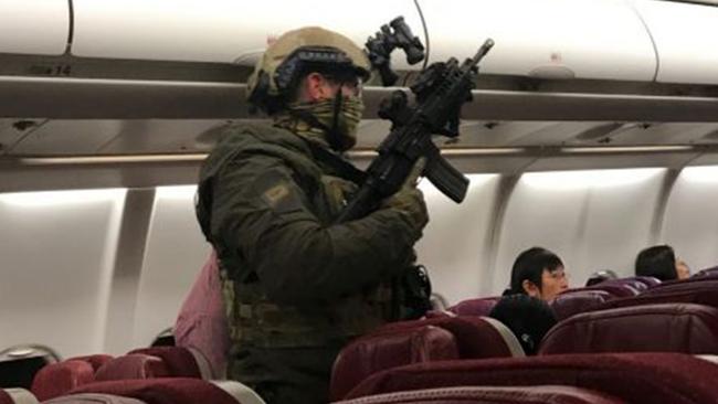 A MALAYSIA Airlines flight was grounded in Melbourne on Wednesday night after a “lunatic” passenger tried to storm the cockpit. Picture: Andrew Leoncelli