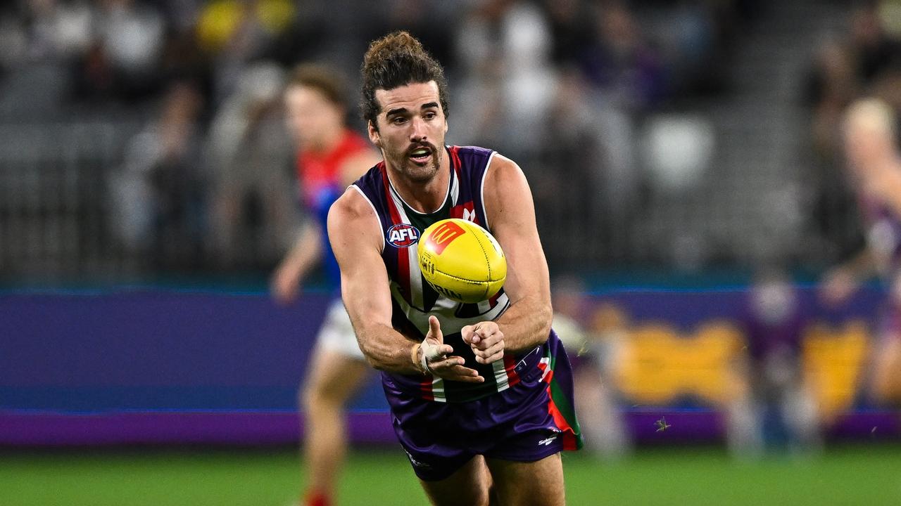 Alex Pearce of the Dockers handpasses the ball. Picture: Daniel Carson/AFL Photos via Getty Images