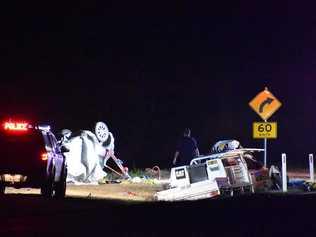 Fatal crash scene on Eton Homebush Rd near Eton. Two cars collided shortly before 6pm. A person, belileved to be a woman, was trapped in one of the vehicles. Picture: Tara Miko