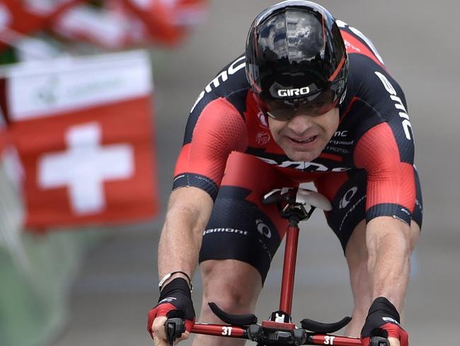 Australia's Cadel Evans of team BMC Racing crosses the finish line during the 7th stage, a 24,5 km race against the clock from Worb to Worb, at the 78th Tour de Suisse UCI ProTour cycling race, in Worb, Switzerland, Friday, June 20, 2014. (AP Photo/Keystone,Peter Schneider)