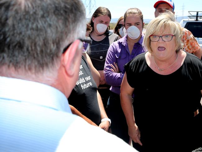 A furious Michelle Coles confronts Ian Hunter at the Northern Power Station in Port Augusta. Picture: Calum Robertson