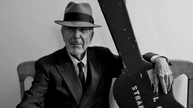 Leonard Cohen with his guitar ready to go out on tour. Picture: Courtesy of the Cohen Estate