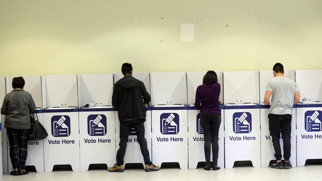 Voters cast their votes in the Hill Shire Council Election. Pic: AAP Image/Jeremy Piper