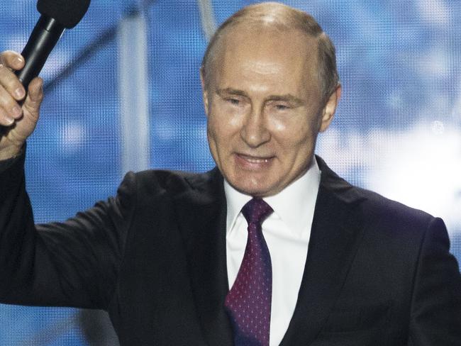 Russian President Vladimir Putin attends a concert in Sevastopol, Crimea, Wednesday, March 14, 2018. (AP Photo/Alexander Zemlianichenko)
