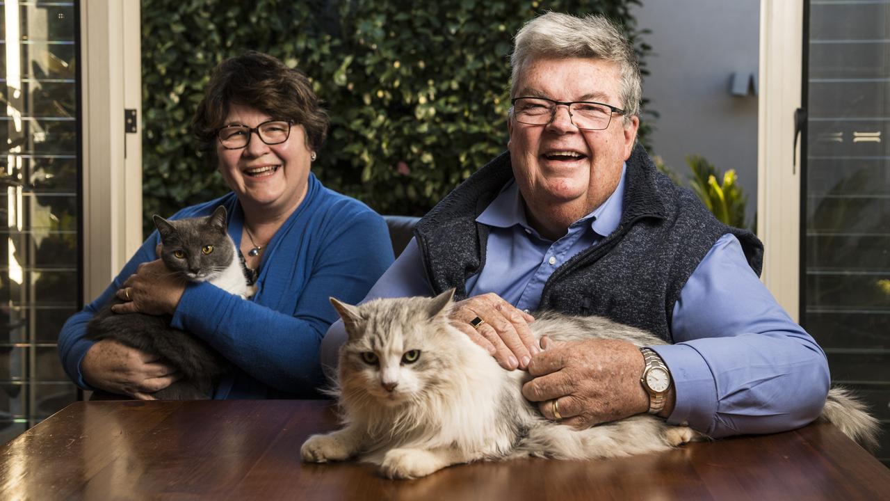 NEXT CHAPTER: Derek Tuffield at home with his wife Rosemerry and cats Moomoo (left) and Simba as the Lifeline Darling Downs CEO announces his retirement after 34 great years with the organisation. Picture: Kevin Farmer