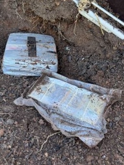 Buried cash was also uncovered during the raids across Adelaide’s north and northeast. Picture: SA Police