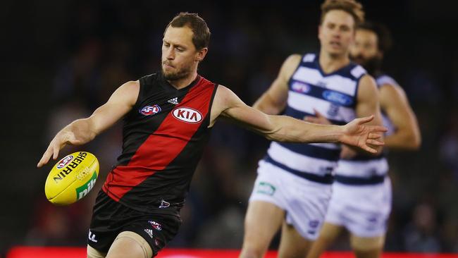 James Kelly drives Essendon into attack against Geelong.