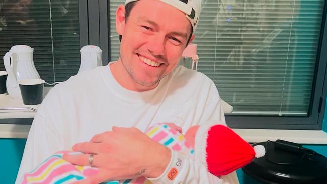 Lachie Neale with baby Freddie.