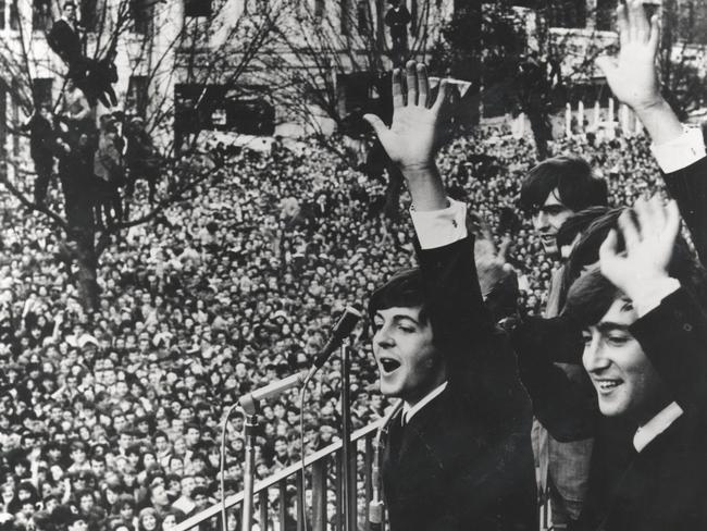 The Beatles greet the crowd outside the Southern Cross Hotel on June 4, 1964. Picture: HWT Library