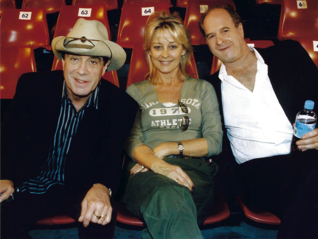 Molly Meldrum (left) with Sue and Michael Gudinski.