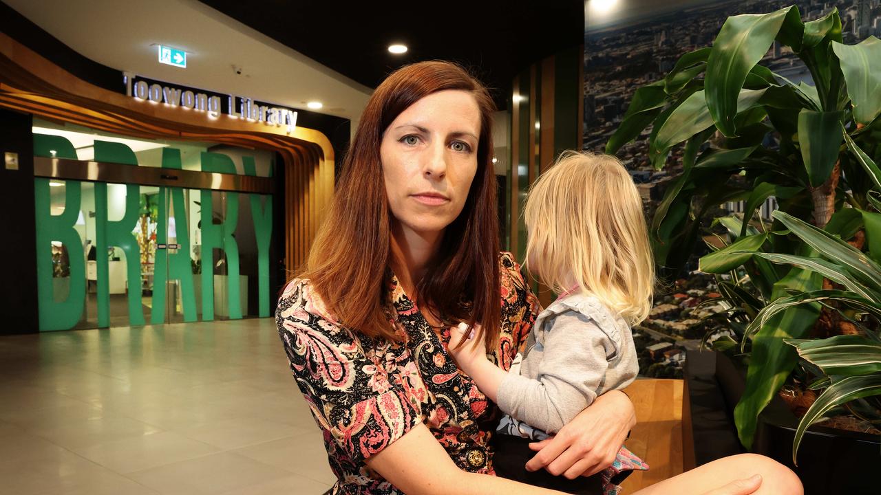 Dr Harriet Dempsey-Jones, with daughter Lyra, 2, outside Toowong Library. She raised her concerns last year after council told parents that toddler reading sessions would be cut. Picture: Liam Kidston