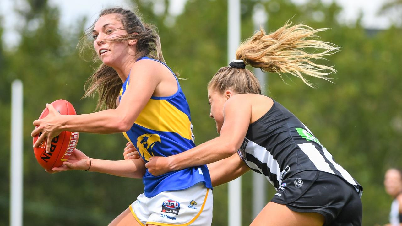 Niamh Kelly of the Eagles is tackled by Sarah Rowe of the Magpies. Picture: Natasha Morello