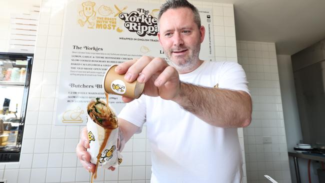 Owner Dennis Duncanson with some of the delicious food at The Yorkie Rippa which recently opened at Nobby Beach. Picture Glenn Hampson