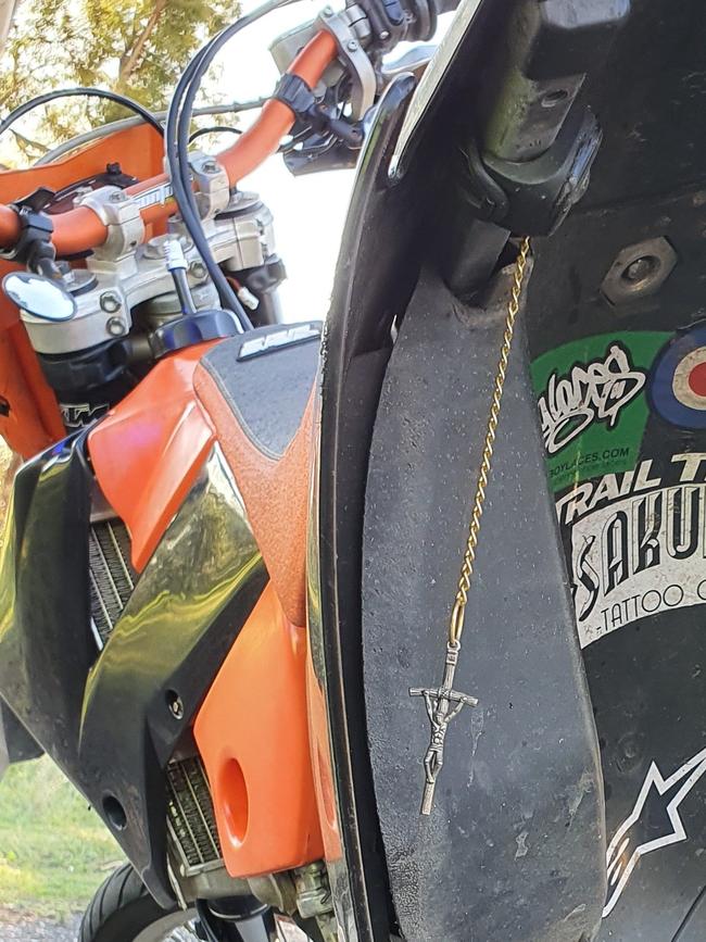 An Avondale Heights man who came off his bike in Diggers Rest and was caught speeding by police, had a crucifix on his bike for protection. Picture: Victoria Police