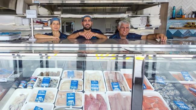 Costa's Seafood cafe owners Maria, Chris and Costa Tapinos at their award-winning Capalaba shop.