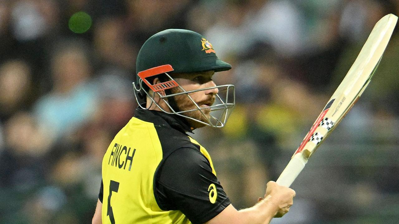 Australiaâ&#128;&#153;s Aaron Finch reacts after being dismissed during the ICC menâ&#128;&#153;s Twenty20 World Cup 2022 cricket match between Australia and New Zealand at the Sydney Cricket Ground (SCG) in Sydney on October 22, 2022. (Photo by Saeed KHAN / AFP) / -- IMAGE RESTRICTED TO EDITORIAL USE - STRICTLY NO COMMERCIAL USE --