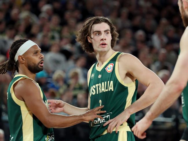 MELBOURNE, AUSTRALIA - AUGUST 16: Patty Mills and Josh Giddey of Australia react during the match between the Australia Boomers and Brazil at Rod Laver Arena on August 16, 2023 in Melbourne, Australia. (Photo by Kelly Defina/Getty Images)