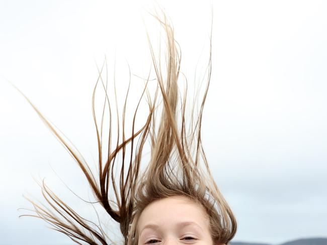 Maisie Nolan, 6, from Bondi at the Echo Point lookout in Katoomba on a cold and windy winters day. The temperature in Katoomba only reached a maximum of 6ÃÂ°C today but with wind gusts of up to 50 km/h it felt like 0ÃÂ°C. Picture: Jonathan Ng