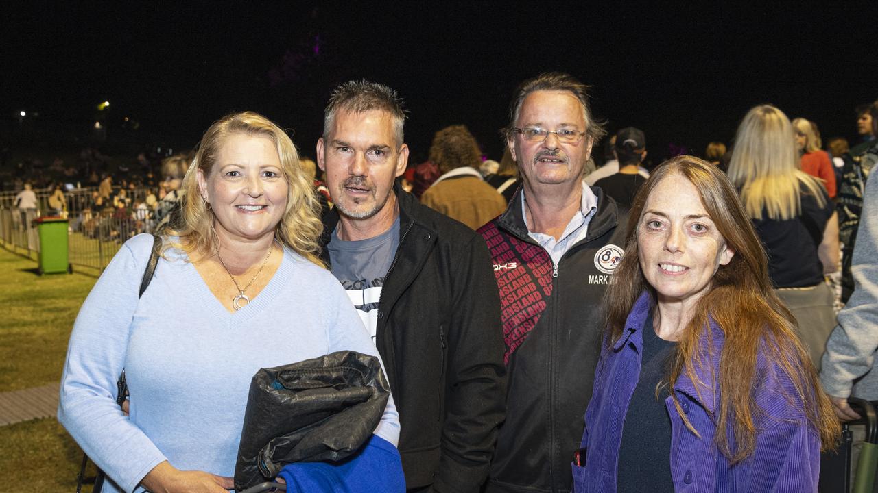 At the Symphony Under the Stars concert performed by the Queensland Symphony Orchestra are (from left) Melanie Millar, Troy Ward, Mark Wood and Guylaine Leduc in Queens Park Amphitheatre for Carnival of Flowers, Friday, October 4, 2024. Picture: Kevin Farmer