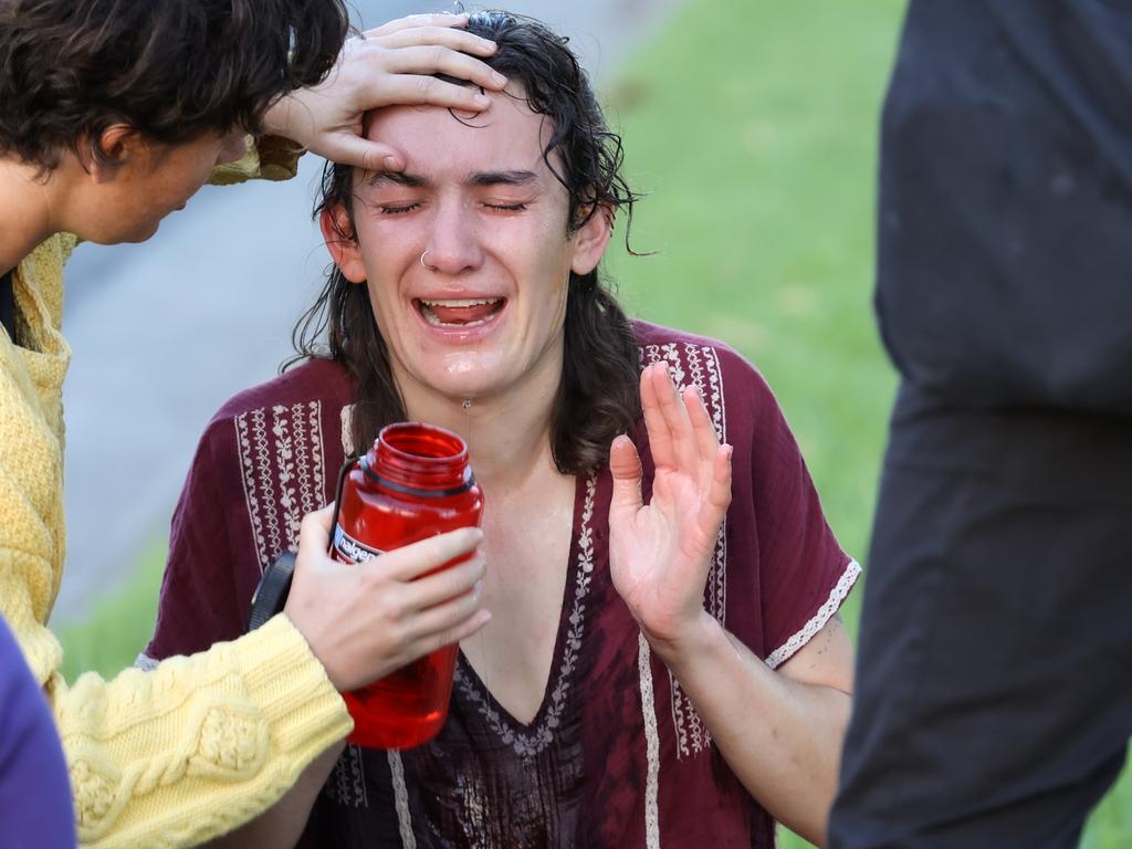 Several of the protesters required their eyes to be flushed with water. Picture: NCA NewsWire / Ian Currie