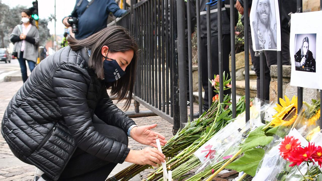 Fans flock to the scene of Taylor Hawkins’s shock death. Picture: AFP