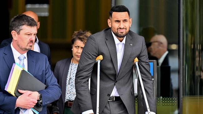 Nick Kyrgios leaves court in Canberra. Picture: Saeed Khan / AFP