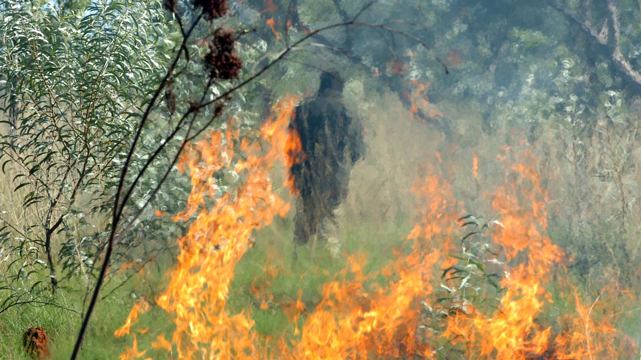 Rangers burning off scrub in the traditional way in the Northern Territory. Northern Beaches Council is looking at integrating Indigenous practices into its fire management policy. Picture: Supplied