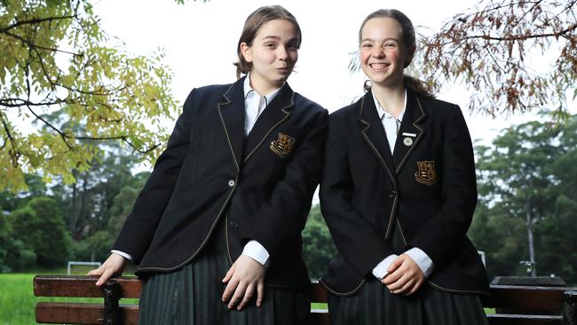 Ukrainian refugee Sofia Shamanska, left, and friend Sahara Wainwright after her first day at Abbotsleigh in Sydney on Thursday. Picture: John Feder