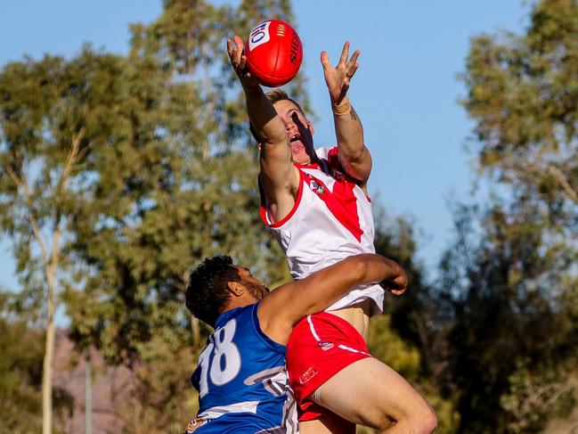 Federal's Braydon Weily takes a big mark over Souths' Thomas Gorey.  Picture: Charlie Lowson