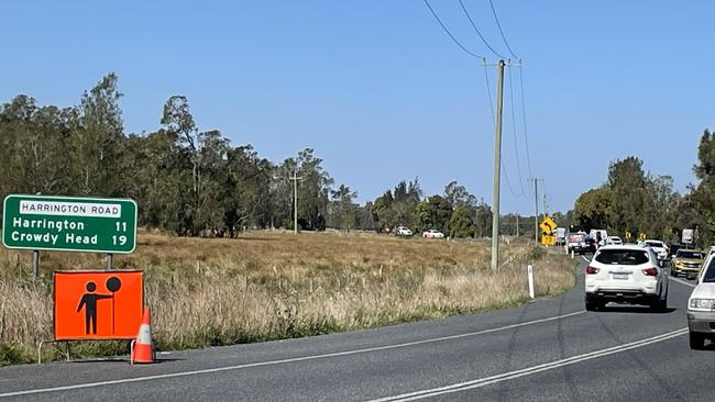 Traffic being directed past the crash site. Picture: Janine Watson/Mid-North Coast News/NewsLocal