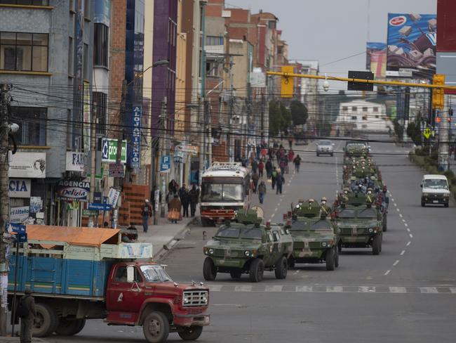 Military armoured vehicles patrol the streets during a quarantine in El Alto, Bolivia. Picture: AP