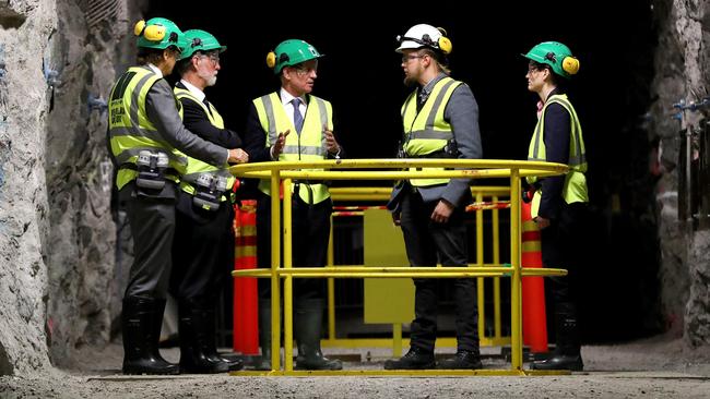 Posiva research co-ordinator Tumos Pere (in the white helmet) speaks to South Australian delegation members Bill Muirhead, John Mansfield, Jay Weatherill and Madeline Richardson at a storage hole in the tunnels 420 meters below the surface. Pic: Calum Robertson