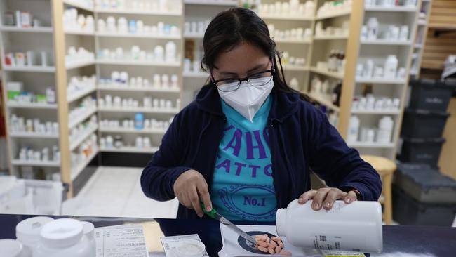 Sonia Rojas works in a pharmacy in Miami, Florida. as the US rushes to hire thousands who can administer COVID-19 vaccines. Picture: Getty Images