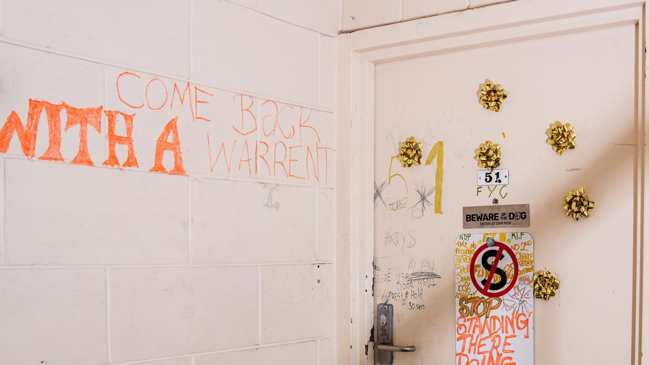 Graffiti demanding to come back “with a warrant.”