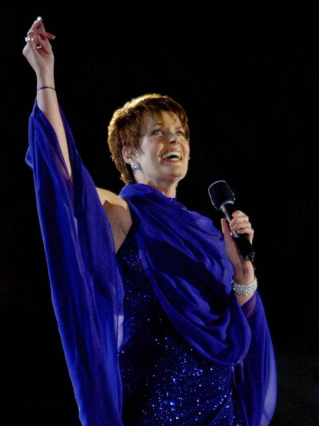 Singer Julie Anthony sings the Australian National Anthem during the 2000 Summer Olympic Games Opening Ceremony. Photo Eric Draper / AP Photo/ Olympic Games.