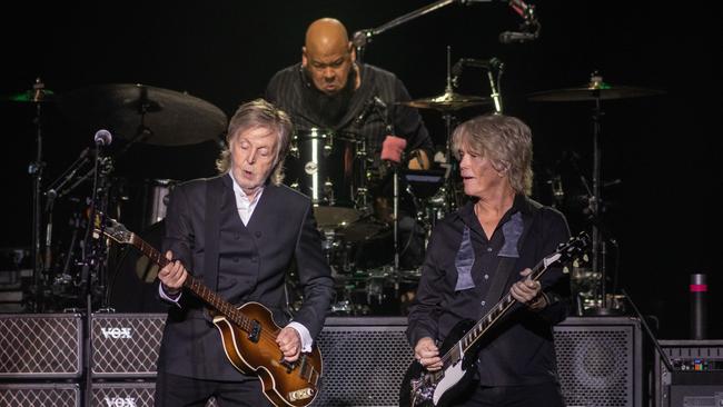 Paul McCartney (left) with Abe Laboriel Jr (centre) and Brian Ray (right) in Adelaide on Wednesday. Picture: Kelly Barnes