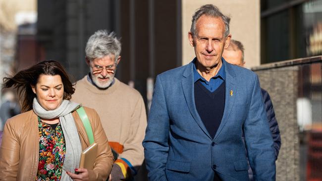 Bob Brown, right, arriving at the Hobart Magistrates Court on Monday.