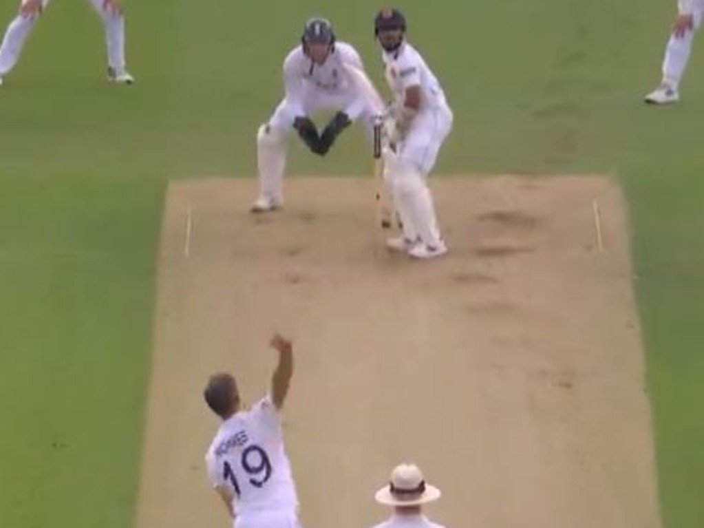 Chris Woakes bowls the ball.